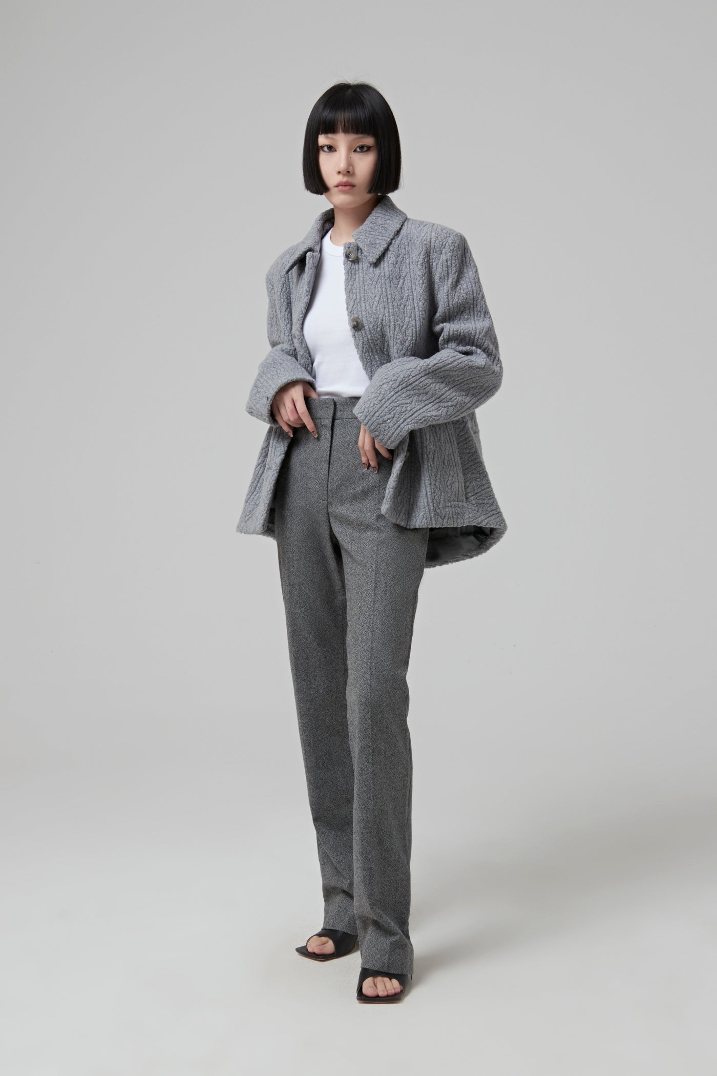 SINGLE BREASTED GREY JACQUARD JERSEY JACKET BUTTONED IN THE FRONT
