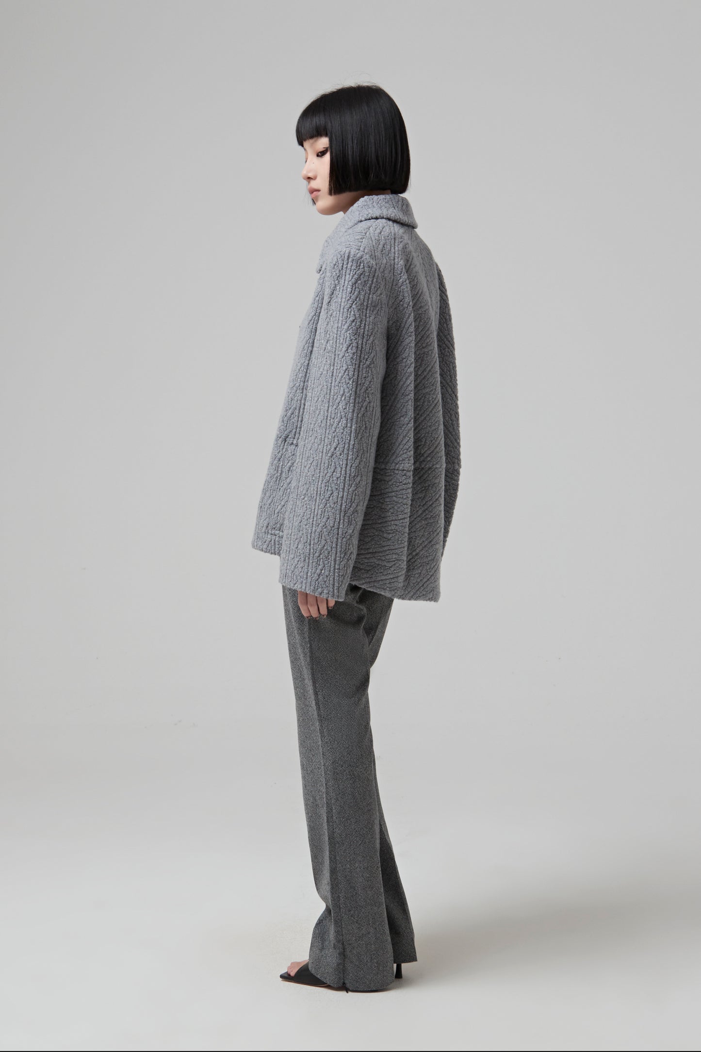 SINGLE BREASTED GREY JACQUARD JERSEY JACKET BUTTONED IN THE FRONT
