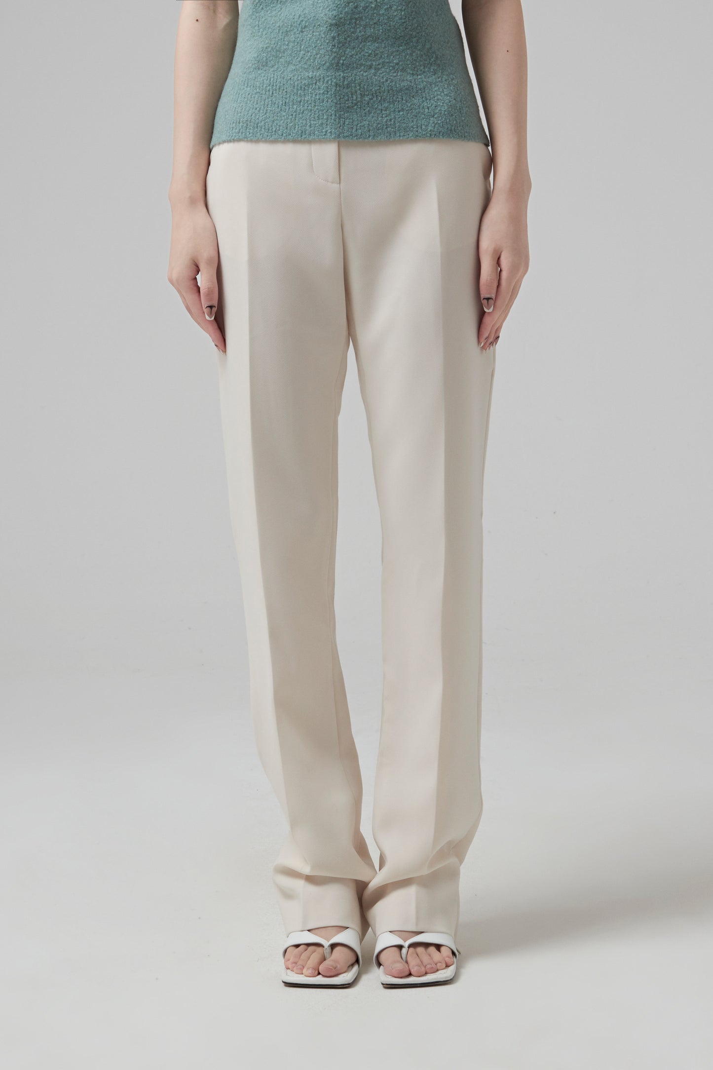 RECYCLED GABARDINE STRAIGHT PANTS. INVISIBLE ZIPPERS IN THE BOTTOM