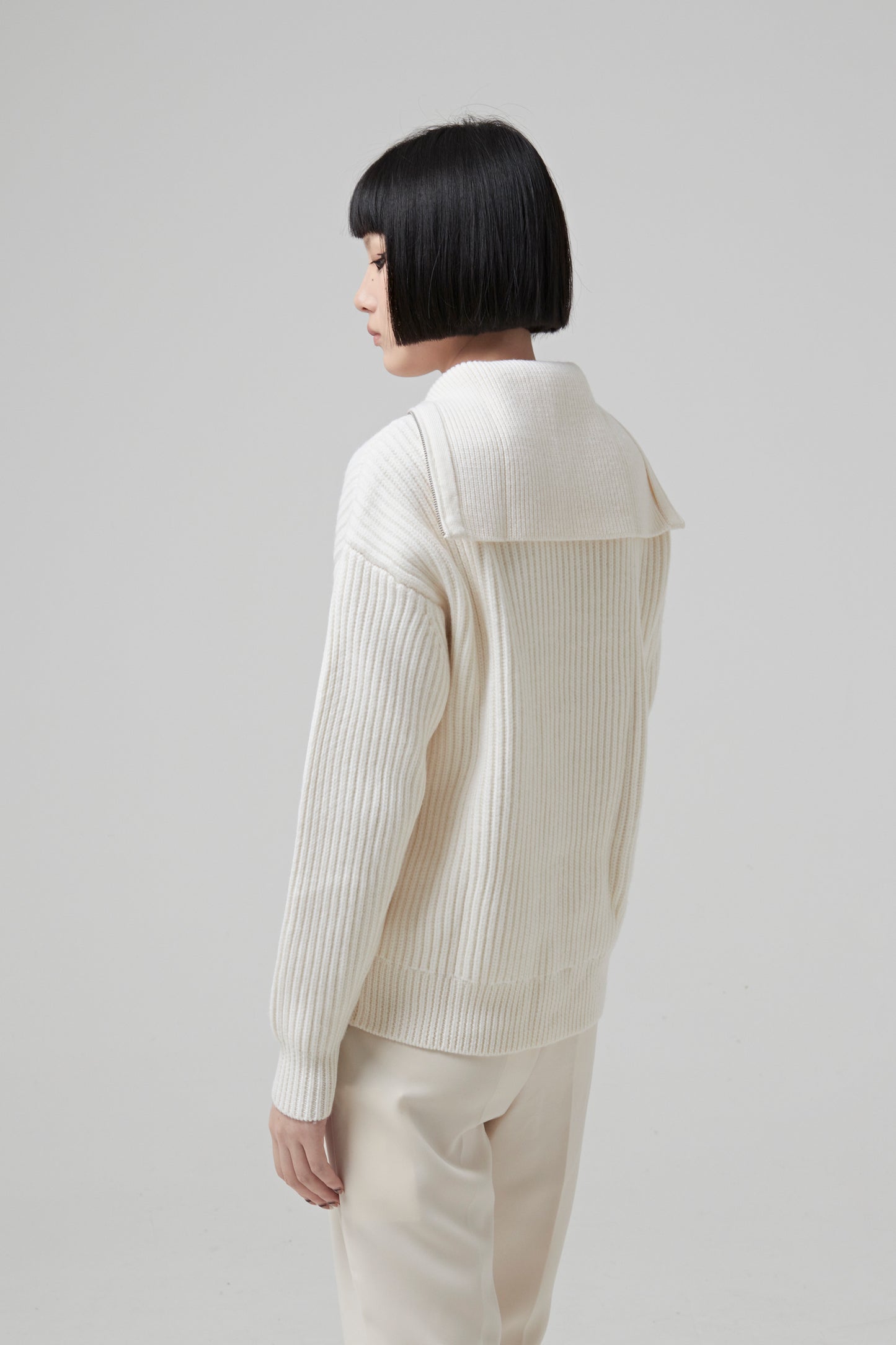 WOOL TRUCKER SWEATER WITH 2 ZIPPED SLITS AT THE BOTTOM