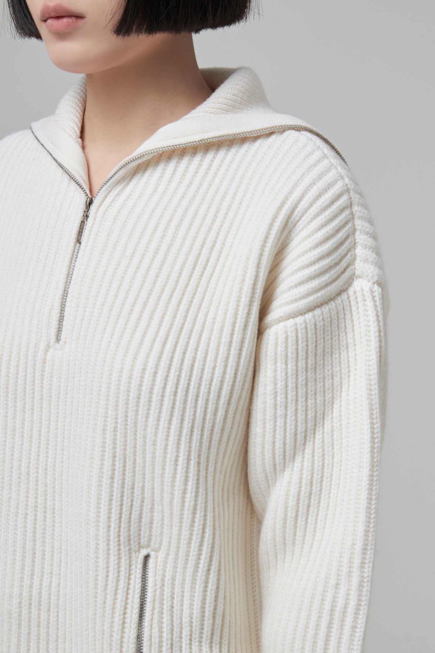 WOOL TRUCKER SWEATER WITH 2 ZIPPED SLITS AT THE BOTTOM
