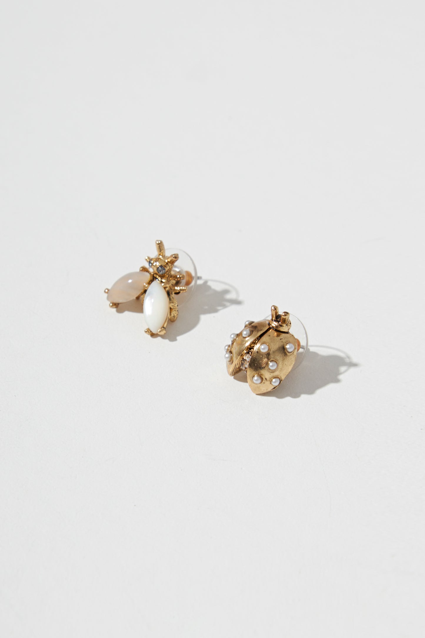 ASYMMETRIC LADYBUG EARRING