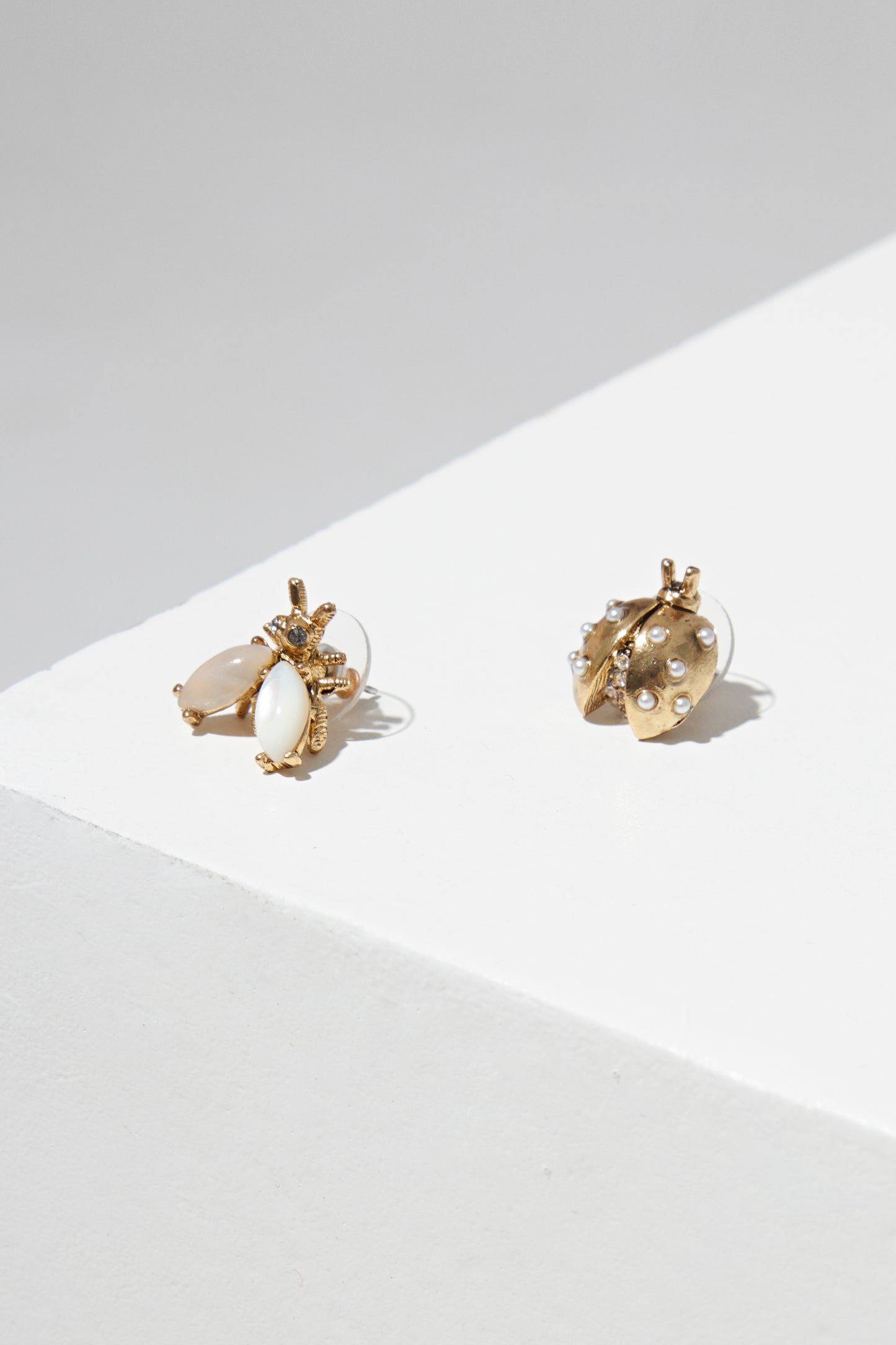 ASYMMETRIC LADYBUG EARRING