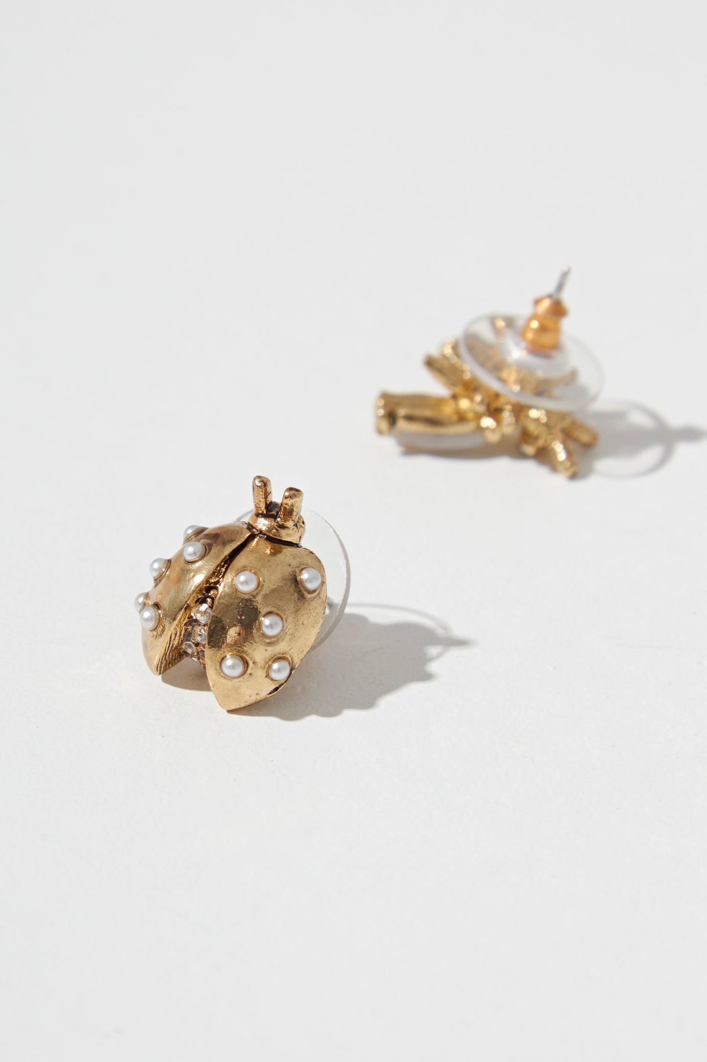ASYMMETRIC LADYBUG EARRING
