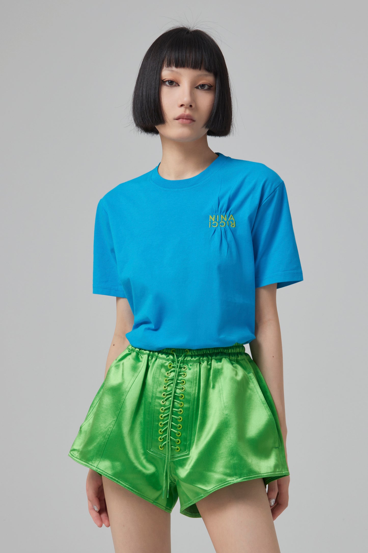 T SHIRT WITH EMROIDERY NINA RICCI CONTRASTED ON THE CHEST