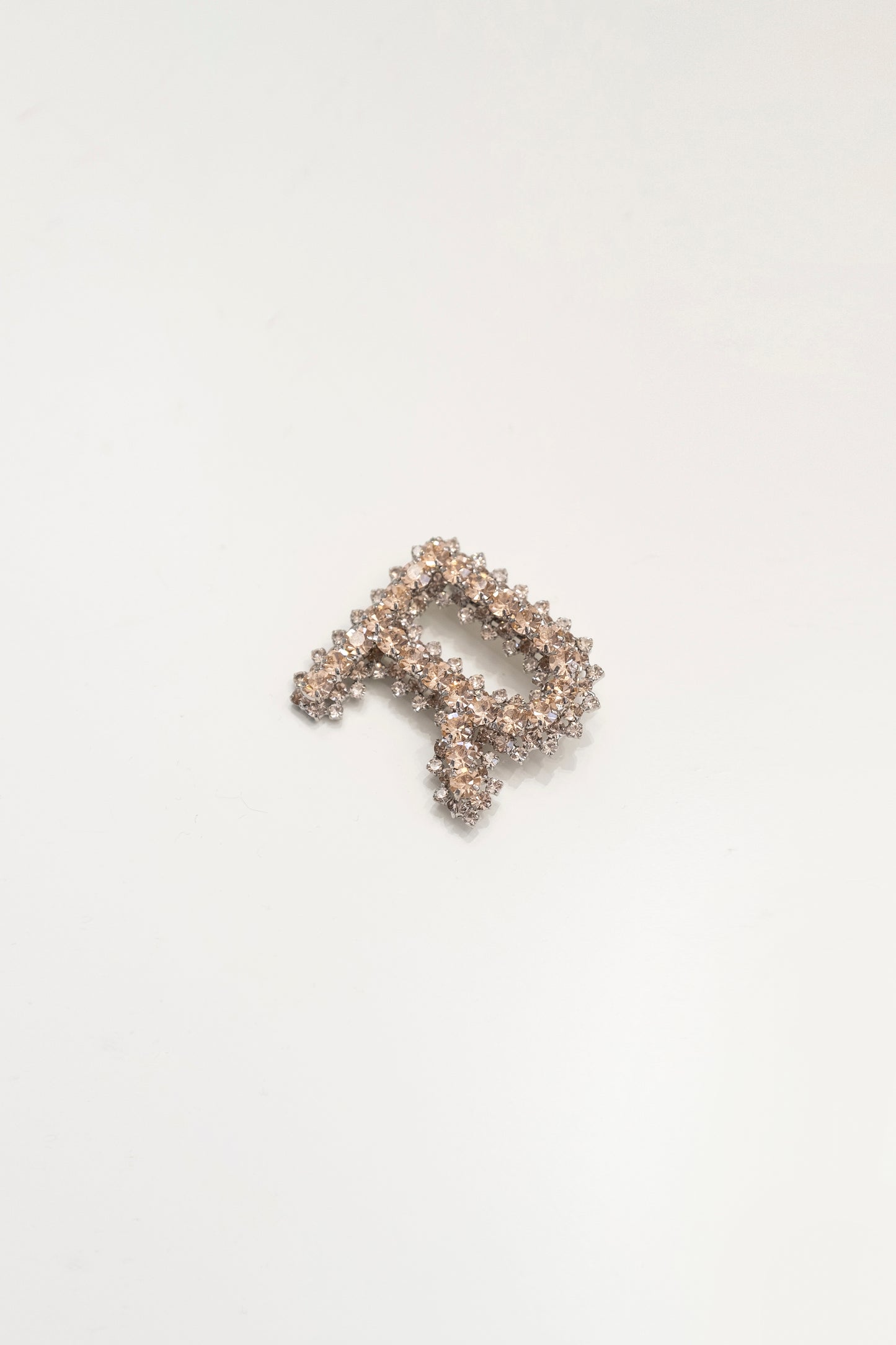 BROOCH IN CRYSTALS AND METAL