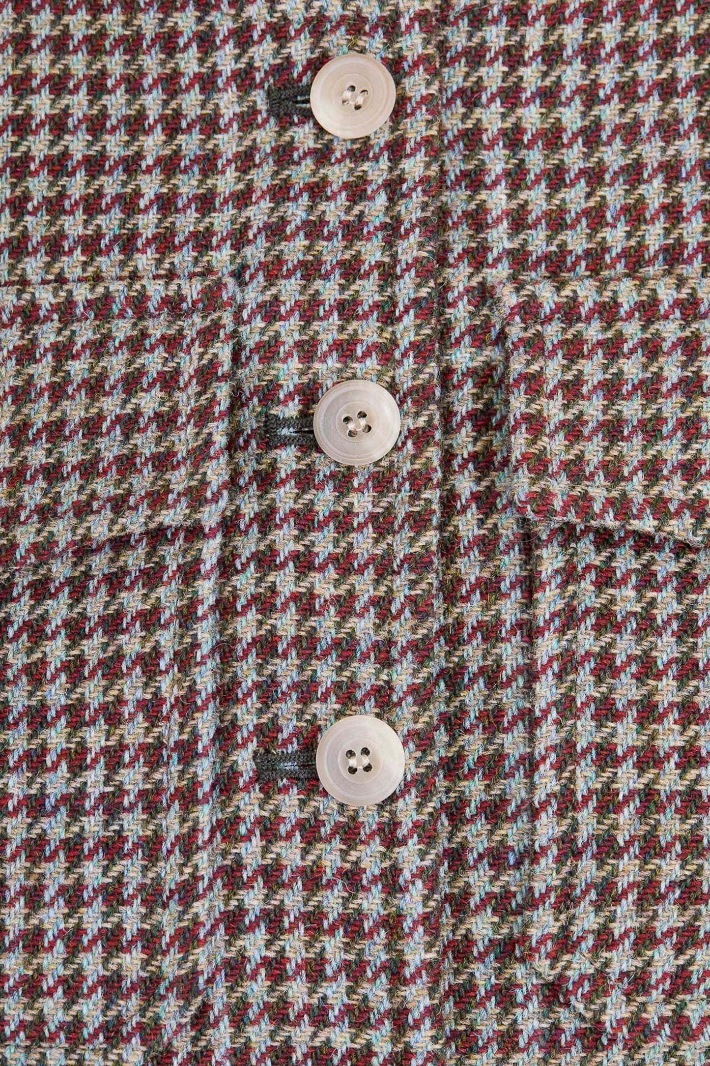 THE LUCIA VEST WOOL HOUNDSTOOTH HUNTER GREEN AND BERRY RED
