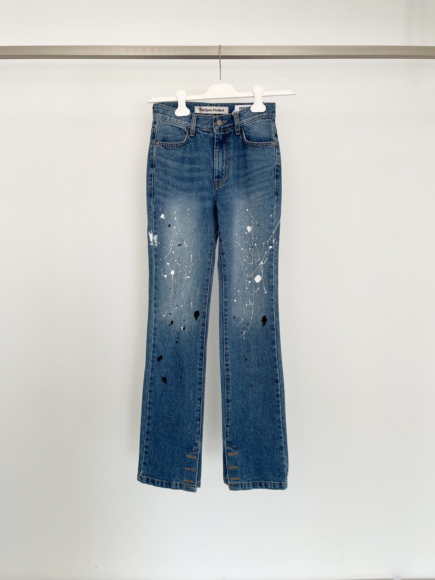 PAINT DROP SIDE BUTTON SKINNY JEANS
