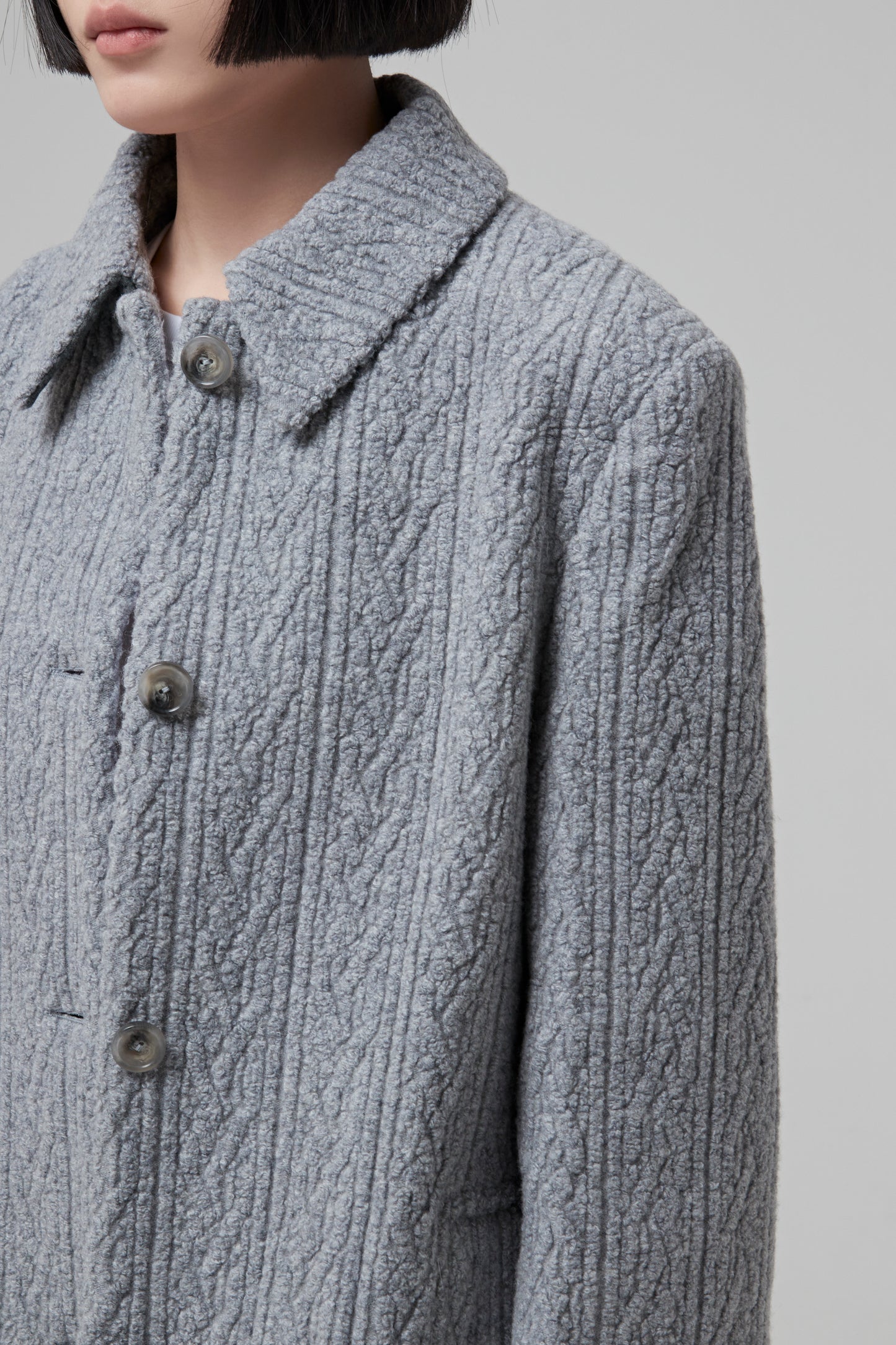 SINGLE BREASTED GREY JACQUARD JERSEY JACKET BUTTONED IN THE FRONT