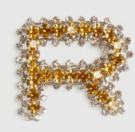 BROOCH IN CRYSTALS AND METAL