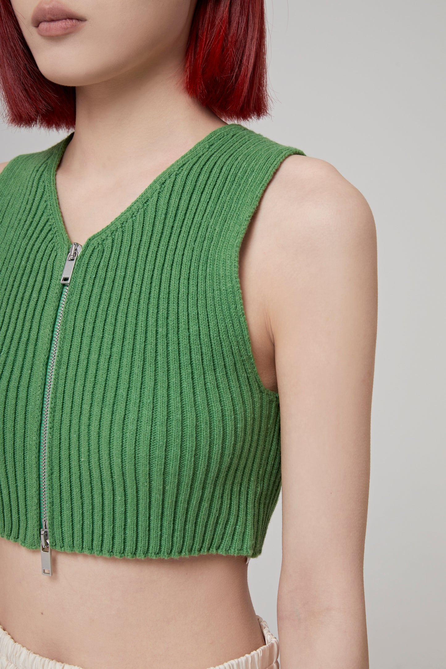 KNITTED ZIP-UP CROP TOP