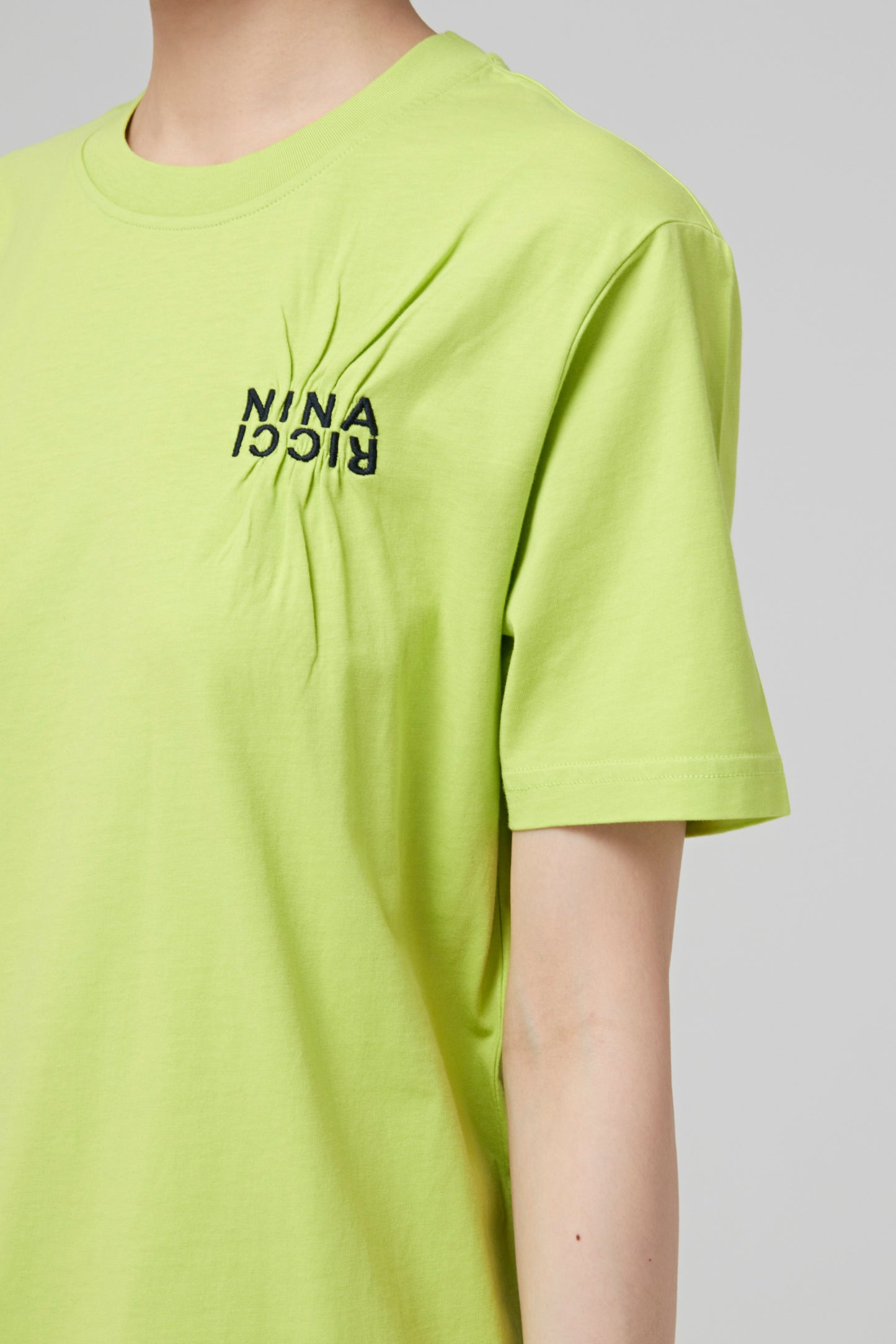 T SHIRT WITH EMROIDERY NINA RICCI CONTRASTED ON THE CHEST