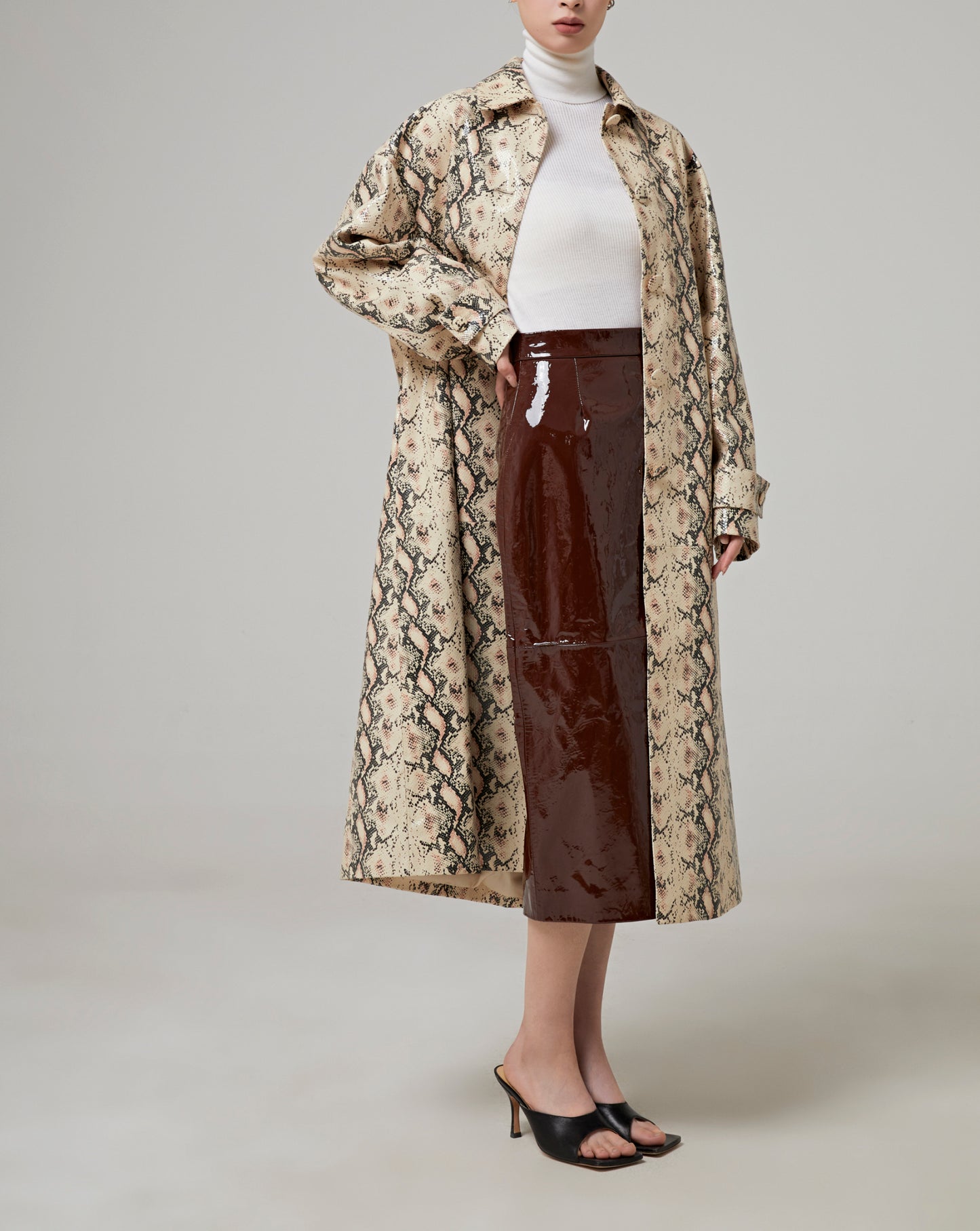 COAT IN PYTHON EFFECT LEATHER