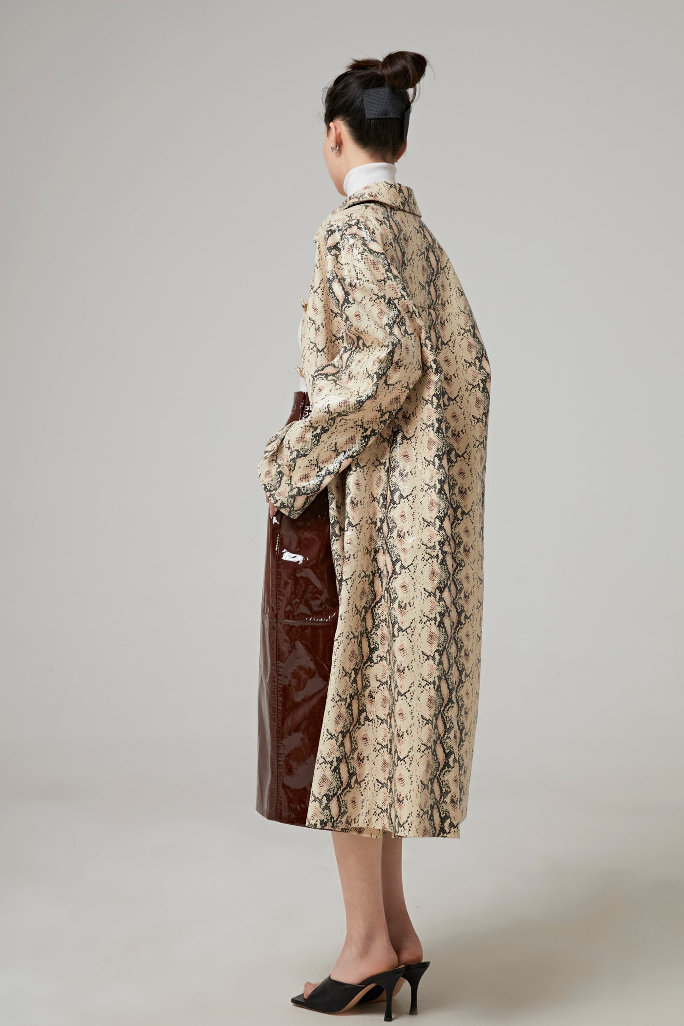 COAT IN PYTHON EFFECT LEATHER