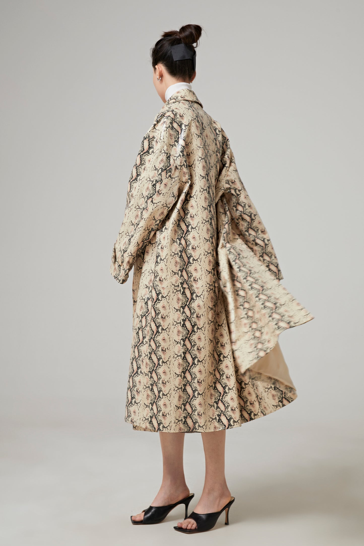 COAT IN PYTHON EFFECT LEATHER