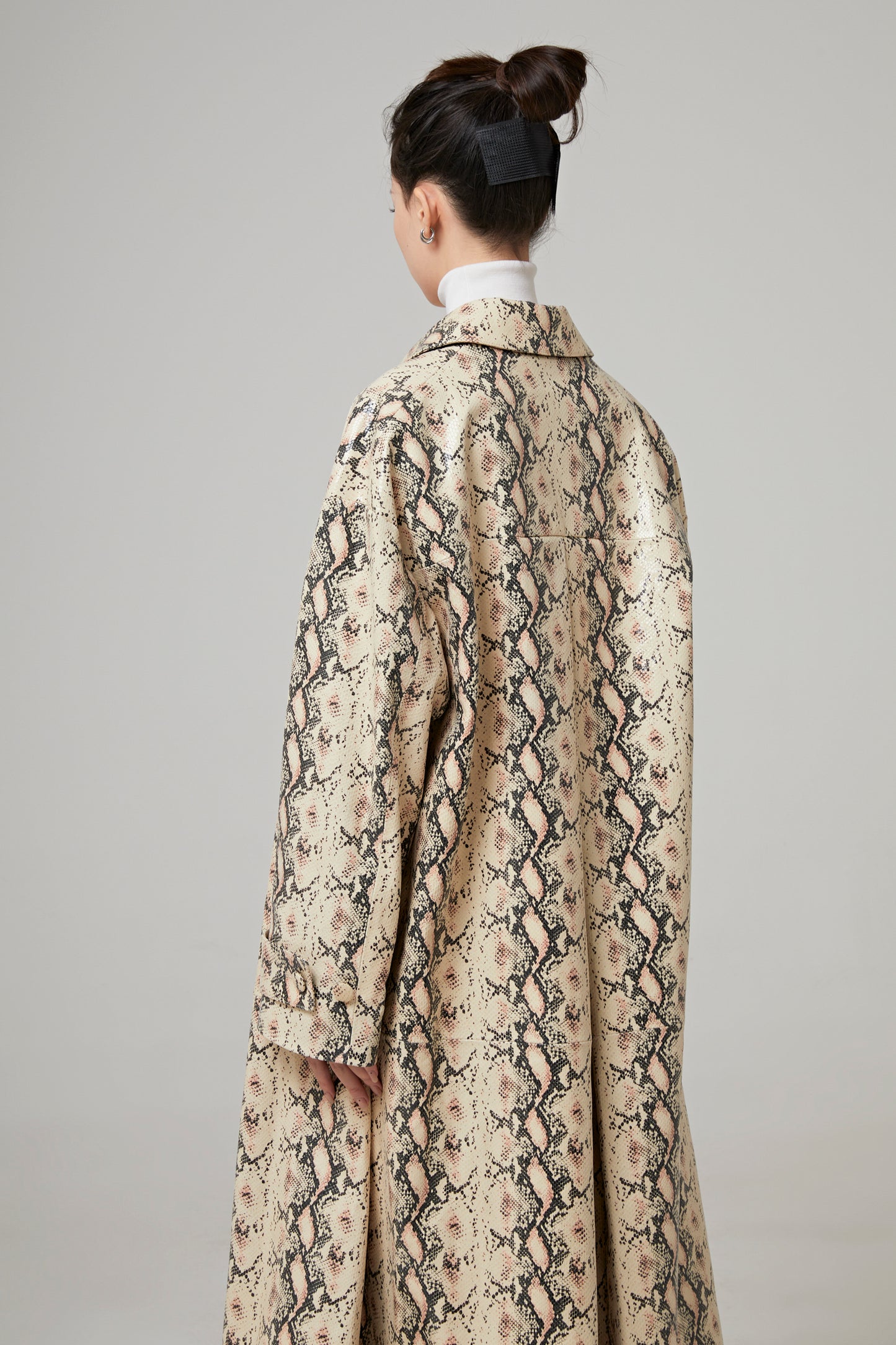 COAT IN PYTHON EFFECT LEATHER