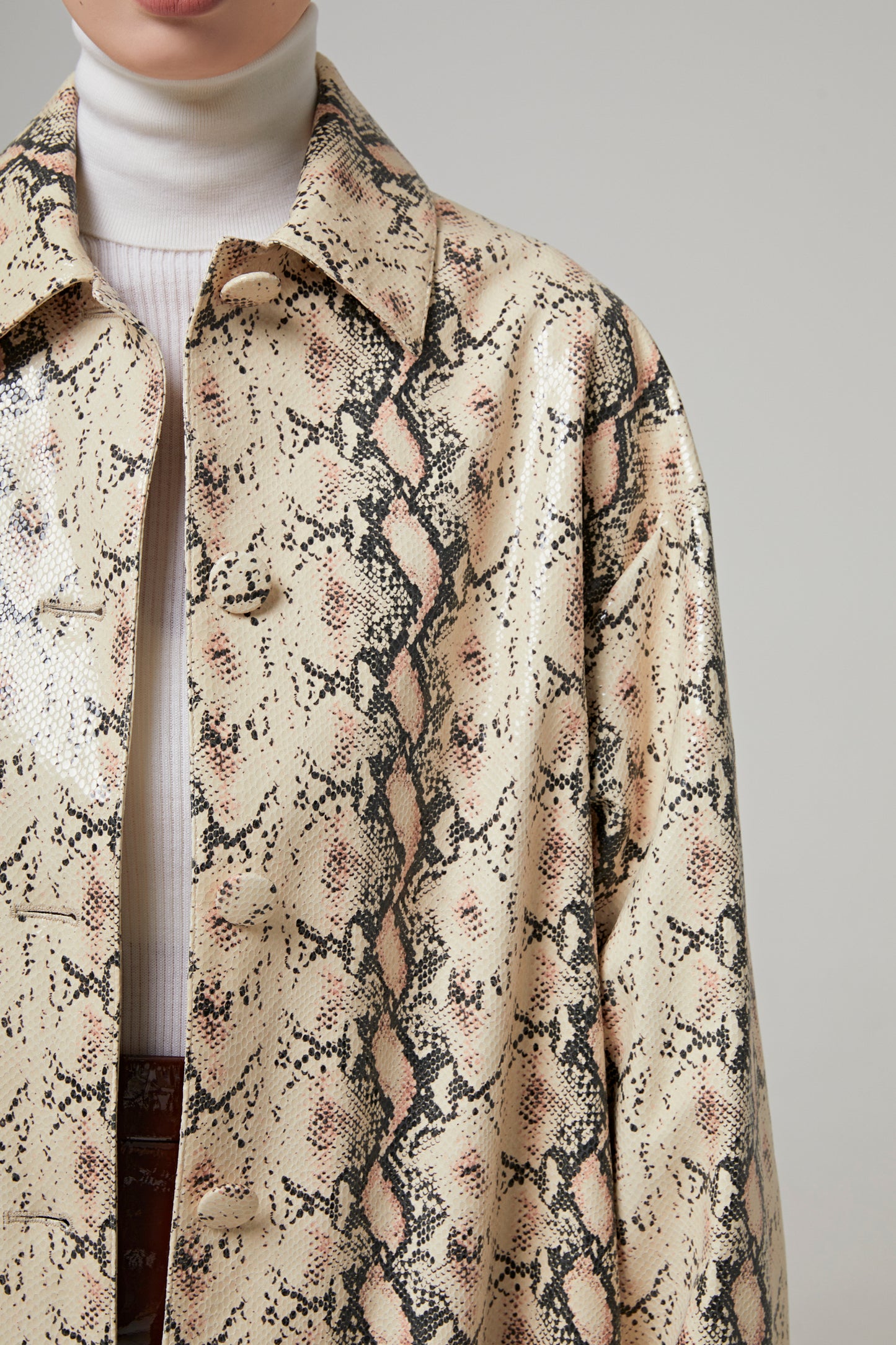 COAT IN PYTHON EFFECT LEATHER
