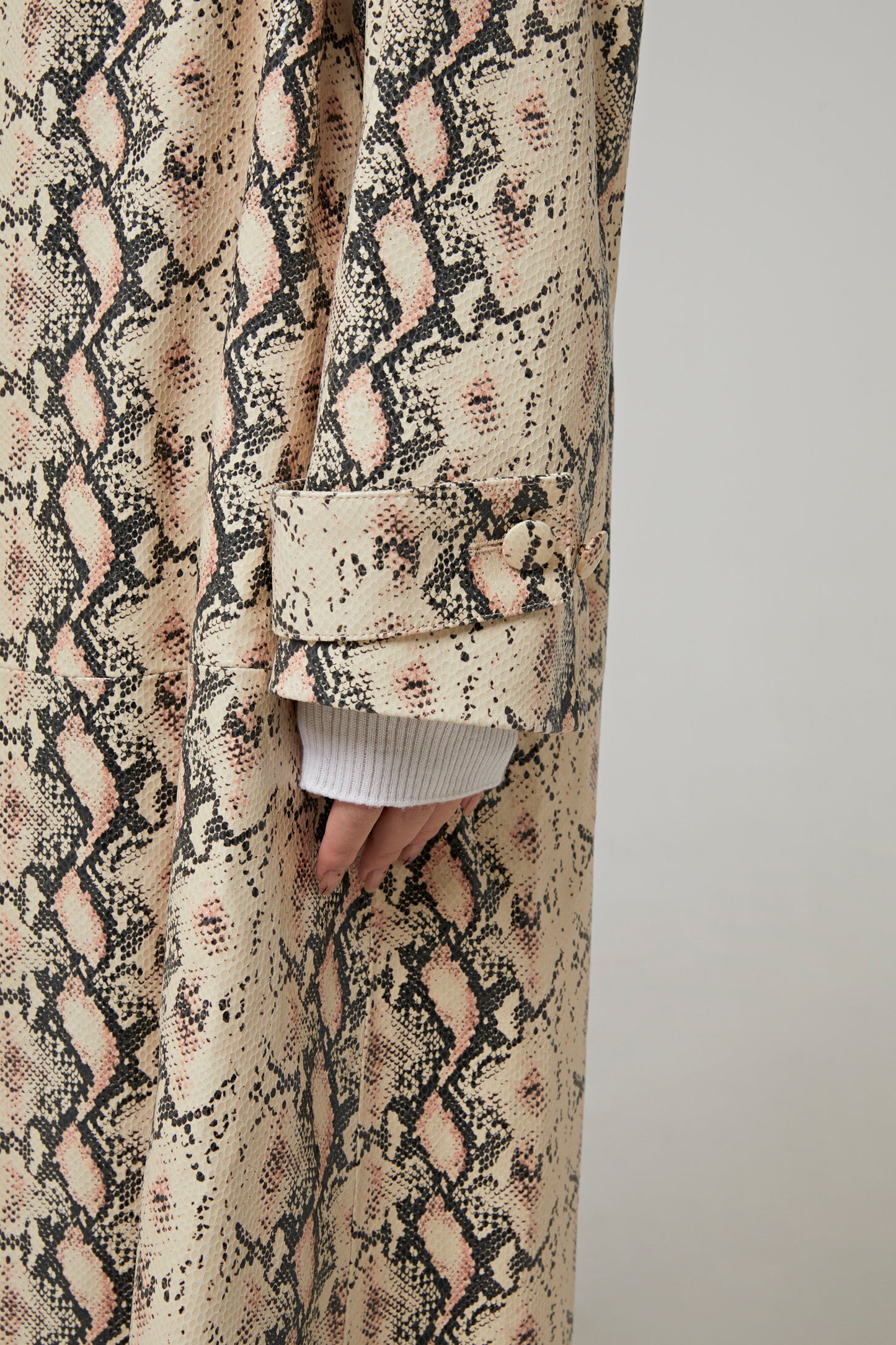 COAT IN PYTHON EFFECT LEATHER