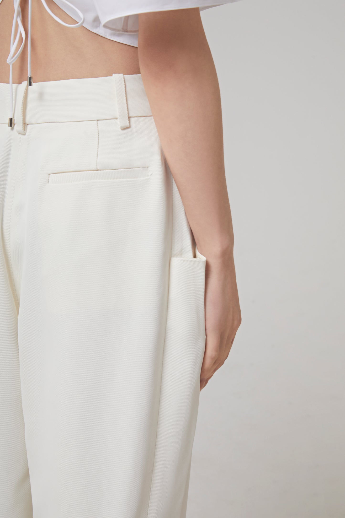 DRAPED POCKET TROUSER