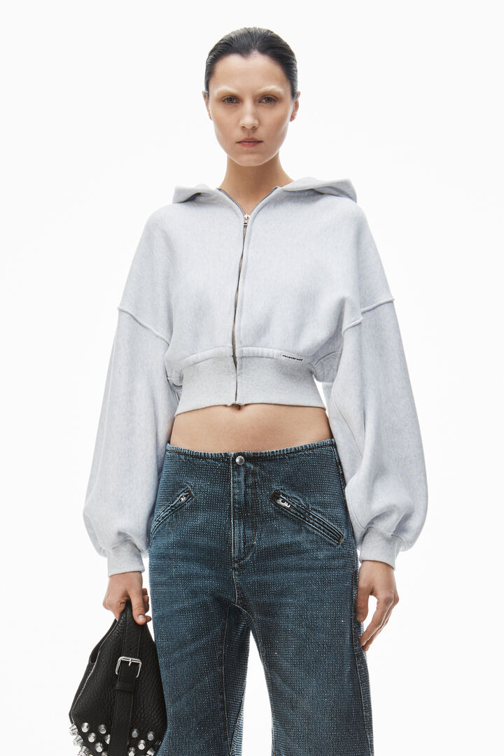 CROPPED ZIP UP HOODIE WITH BRANDED SEAM LABEL