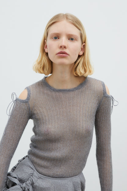 TOP WITH CUT-OFF SHOULDERS