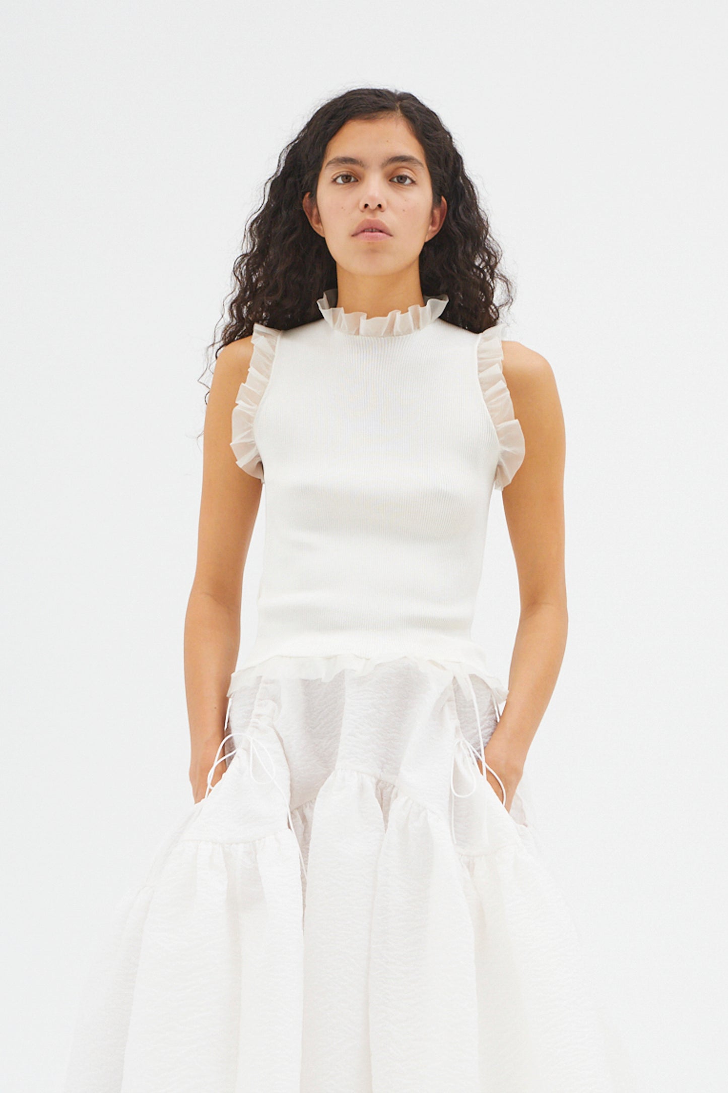 SLEEVELESS TOP WITH RUFFLED DETAILS